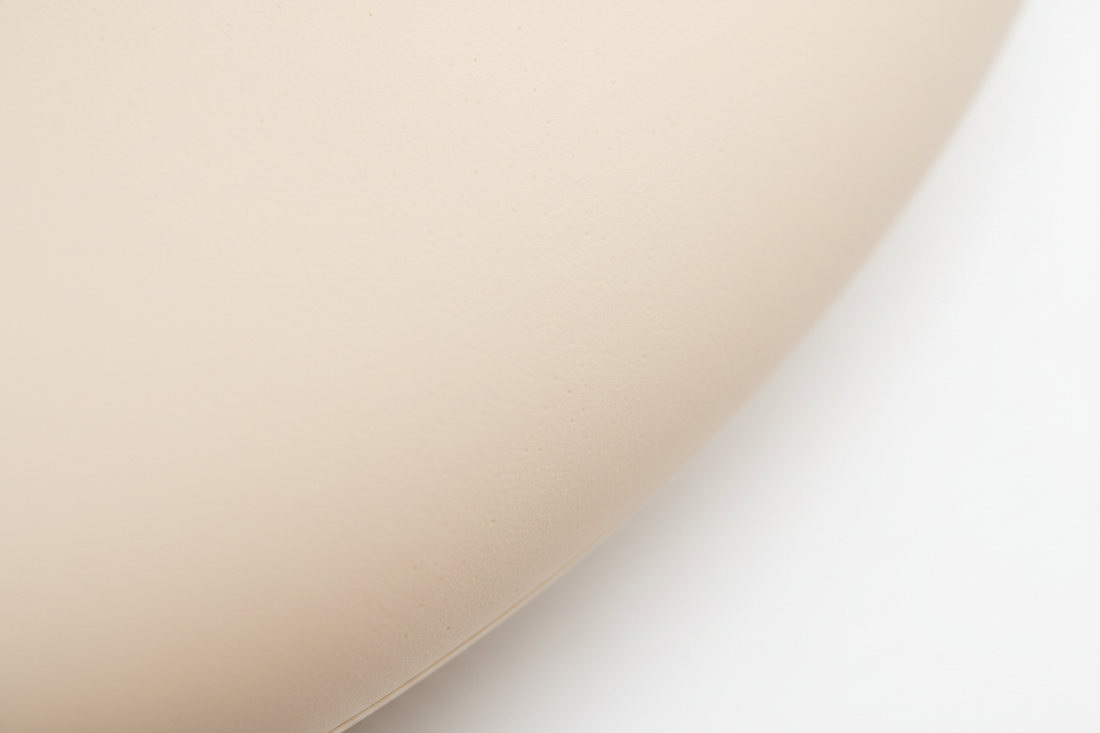 Close-up of a premium matte silicone surface showcasing  RealTouch Lab's Velvet Shield™ coating — velvety smooth,  skin-like finish with zero plastic sheen, body-safe and  non-porous.
