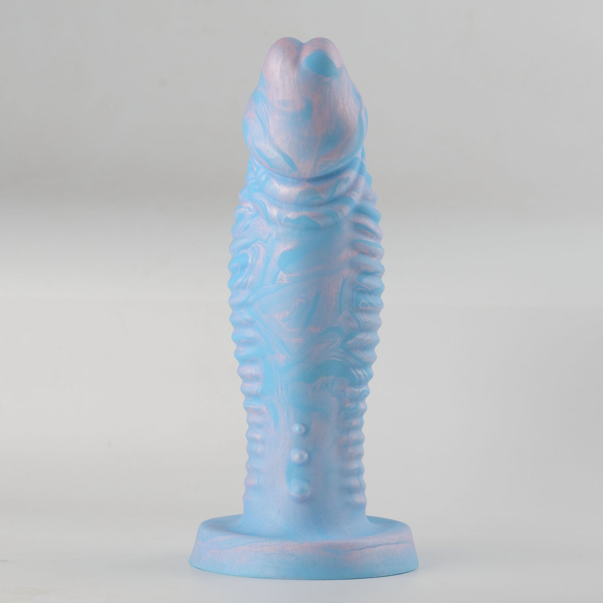 Leviathan Fantasy Collection silicone dildo - full front view standing on flat round base showing sky blue and pink-purple marble swirl colorway with fantasy forked tip, dense horizontal rib ring texture along full shaft length - no-scrotum design - body-safe platinum-cured single-density silicone | RealTouch Lab
